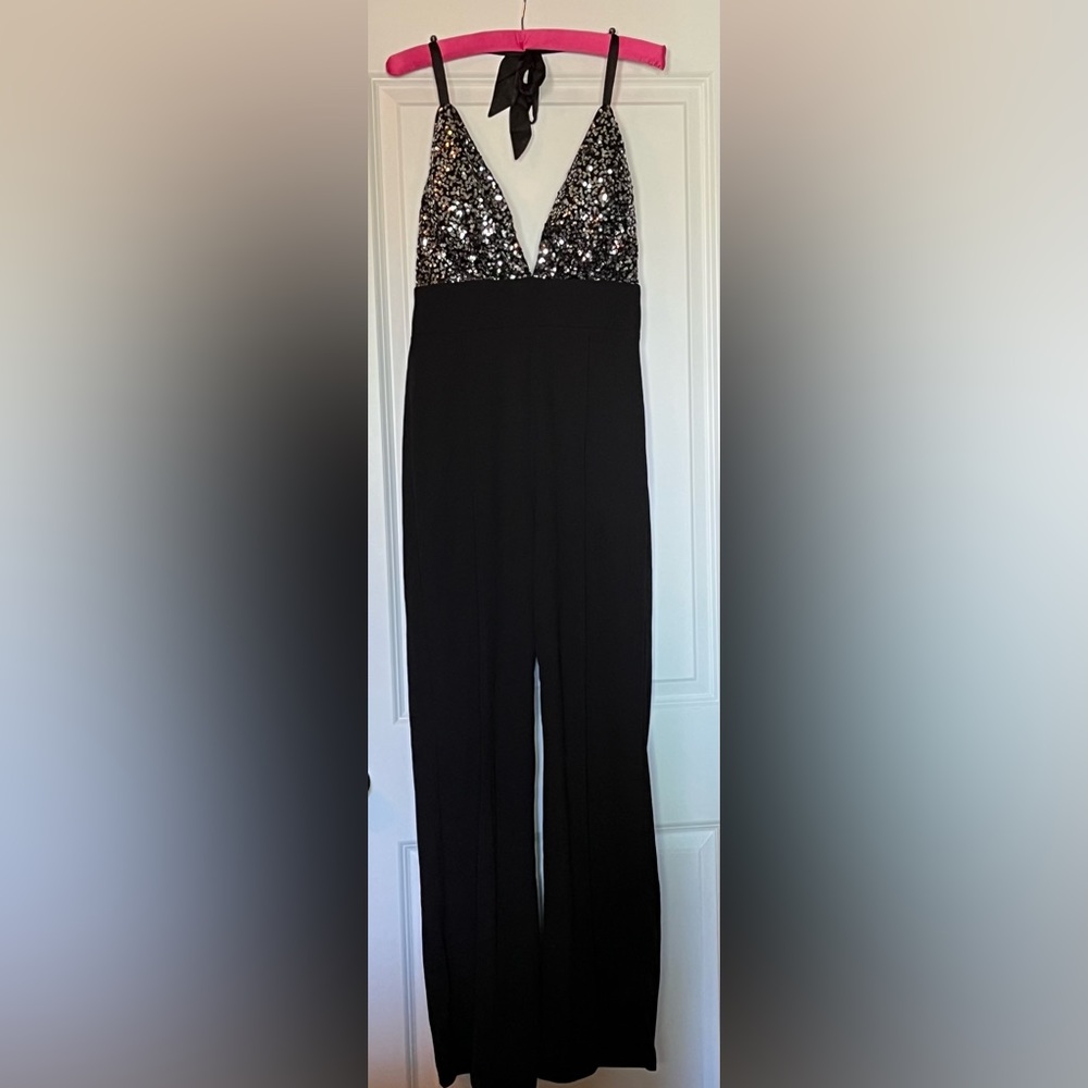 NWT Black Sequin Jumpsuit. Size Medium